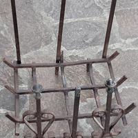 Griglia portalegna in ferro per camino