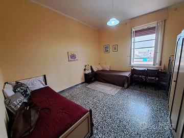 Una camera per studenti presso lettere