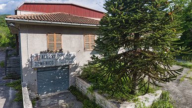 Capannone e abitazione