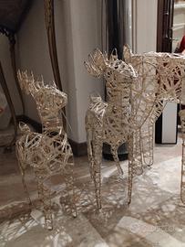tris renne di natale con luci