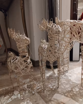 tris renne di natale con luci