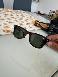 Occhiali Rayban e cuffie air pod pro