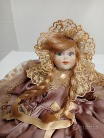 Coppia di bambole in ceramica