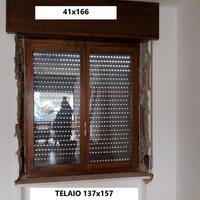 finestra in legno doppia anta