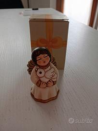 thun angelo con colomba 