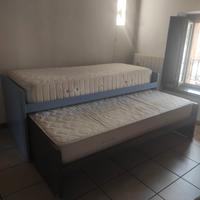 coppia di letti singoli scorrevoli