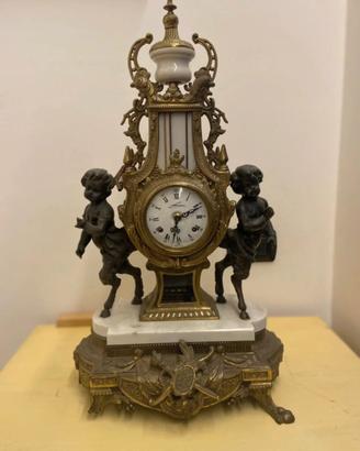 Orologio e candelabri marmo