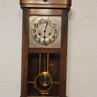 Orologio a muro con pendolo