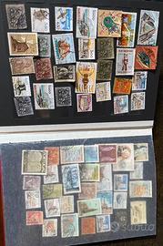 Quattro  album francobolli mondo (8+8+8+10 pag).