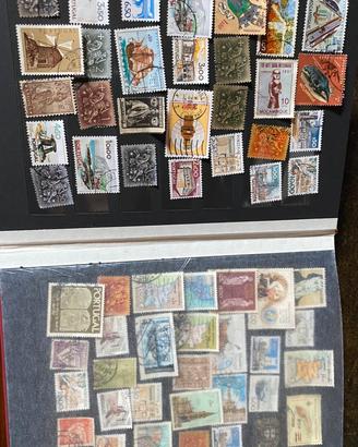 Quattro  album francobolli mondo (8+8+8+10 pag).