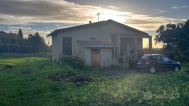 Terreno con fabbricato