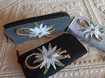 trousse in feltro con applicazione stella alpina