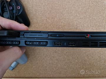 PlayStation 2 slim + videogiochi 