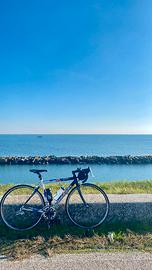 Bici corsa Lee Cougan taglia S + borsa viaggio