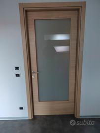 1 porta a battente DORIGO linea Pegaso con vetro