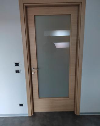 1 porta a battente DORIGO linea Pegaso con vetro