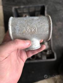 Tes in ghisa mall. zinc. 1 poll e 1/4 riduz 1 poll