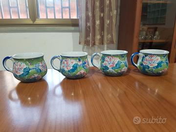 Quattro tazze in porcellana