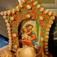 cornice religiosa con conchiglia 