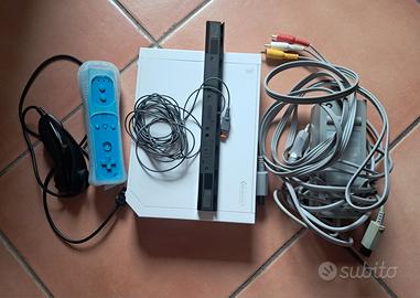 Nintendo Wii + Nindendo Wii Fit Plus