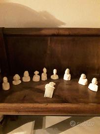 Collezione di 9 statuette pettinature abisssine.