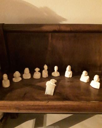 Collezione di 9 statuette pettinature abisssine.