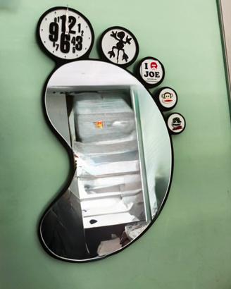 Specchio orologio forma piede