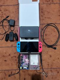 Nintendo switch Oled 64gb - rosso/blu - 2 giochi