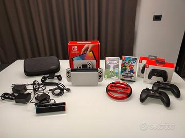 Nintendo Switch OLED Bianca + 2 Giochi + Accessori