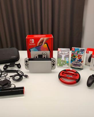 Nintendo Switch OLED Bianca + 2 Giochi + Accessori