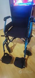 Sedia a rotelle pieghevole