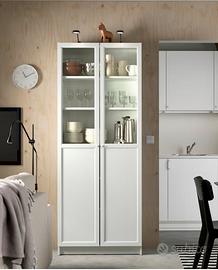 Libreria con  vetrina e scaffali Ikea