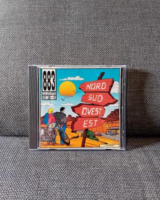 CD 883 - Nord Sud Ovest Est (prima stampa)