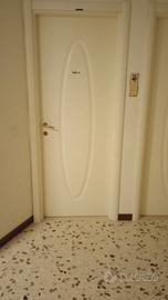 Porte bianche pantografate