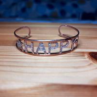 Bracciale donna oro rosa con scritta Happy 