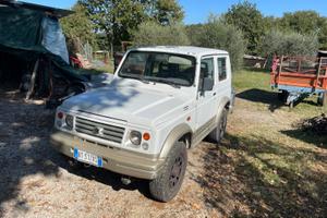Suzuki Samurai con rimorchio per trasporto cani