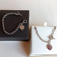 Parure girocollo e bracciale  in acciaio e zircone