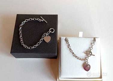 Parure girocollo e bracciale  in acciaio e zircone