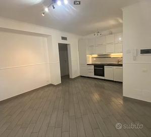 Marino trilocale con portico e 2 posti auto