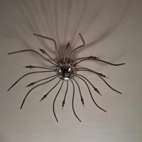 Lampadario in acciaio a raggi