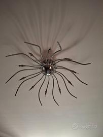 Lampadario in acciaio a raggi