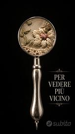 Lente da collana o chatelaine da ricamo vintage