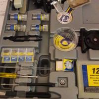 microscopio con accessori