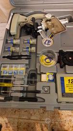 microscopio con accessori