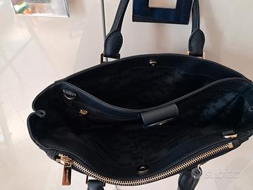borsa Michael kos