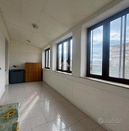 Primo piano in piccola palazzina, Fertilia
