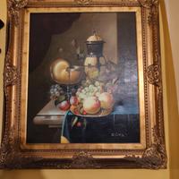 Quadro natura morta con cornice dorata