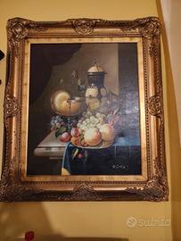 Quadro natura morta con cornice dorata