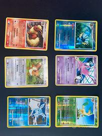 Lotto carte pokemon evoluzione eevee rising rivals
