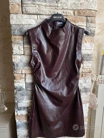 Tubino smanicato collo alto bordo